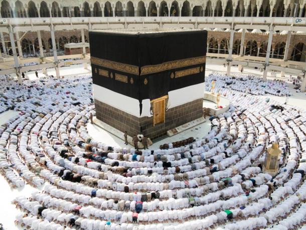 Muslims praying around the Ka'aba in Mecca, Saudi Arabia.