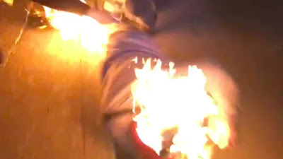 Antifa Rioter Throws Molotov Cocktail at Police