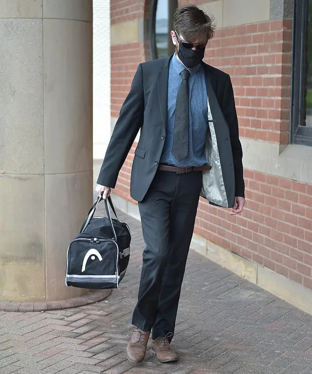 Richard Swinnerton arriving at court with a sports bag.